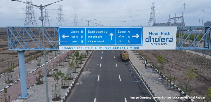 Road signage inside Dholera Industrial City showing Zone A, Zone B and Expressway directions